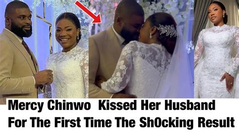 mercy chinwo kiss her husband